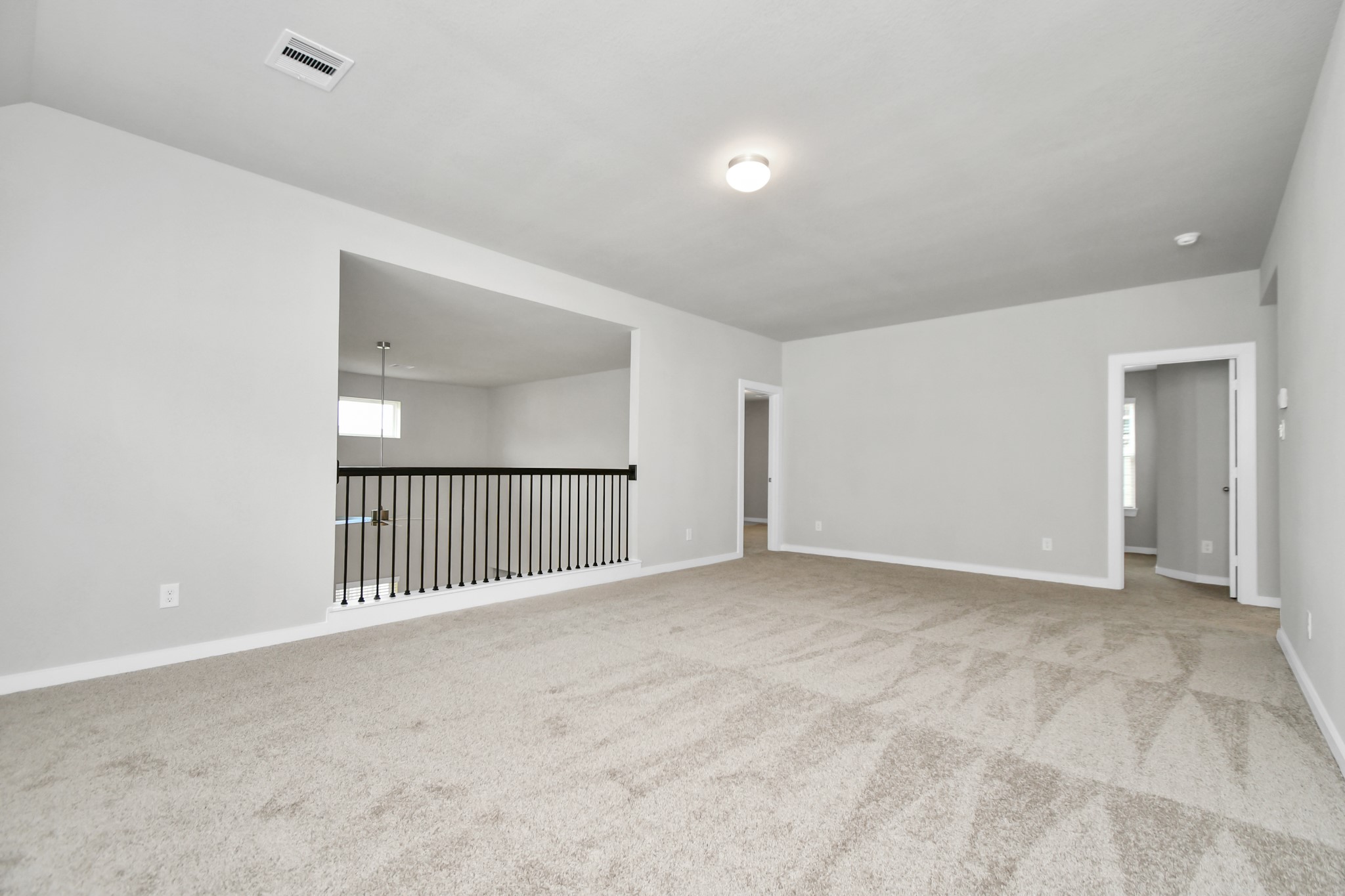 15111 Statice Trail Houston, TX 77044 - Photo 26 of 35 Another view of expansive game room. Sample photo of completed home with similar floor plan. Actual colors and selections may vary.
