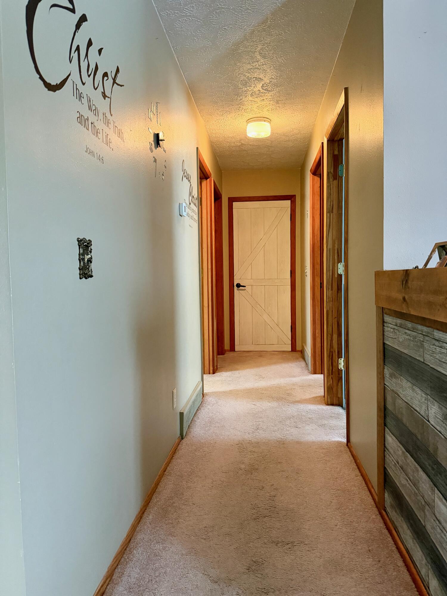 402 East St Louis Street Knox, IN 46534 - Photo 15 of 19 a view of a hallway with painted walls