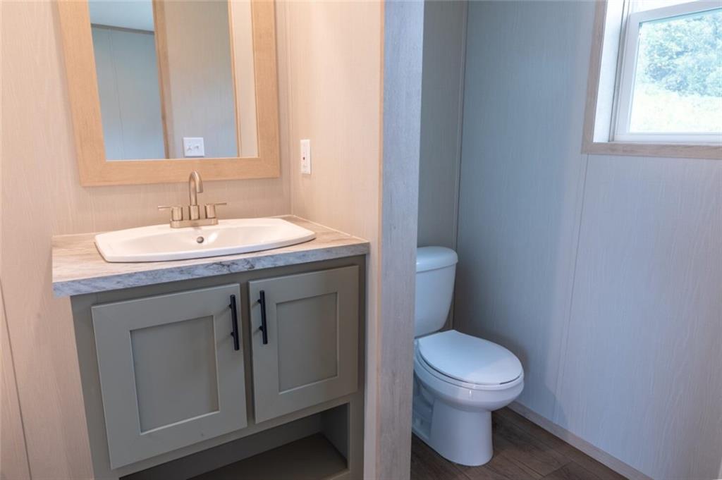 1408 A Hidden Valley Road Bulger, PA 15019 - Photo 15 of 22 a bathroom with a toilet a sink and a window