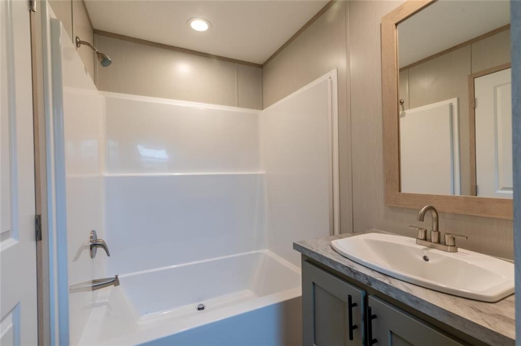 1408 A Hidden Valley Road Bulger, PA 15019 - Photo 16 of 22 a bathroom with a sink and a bathtub