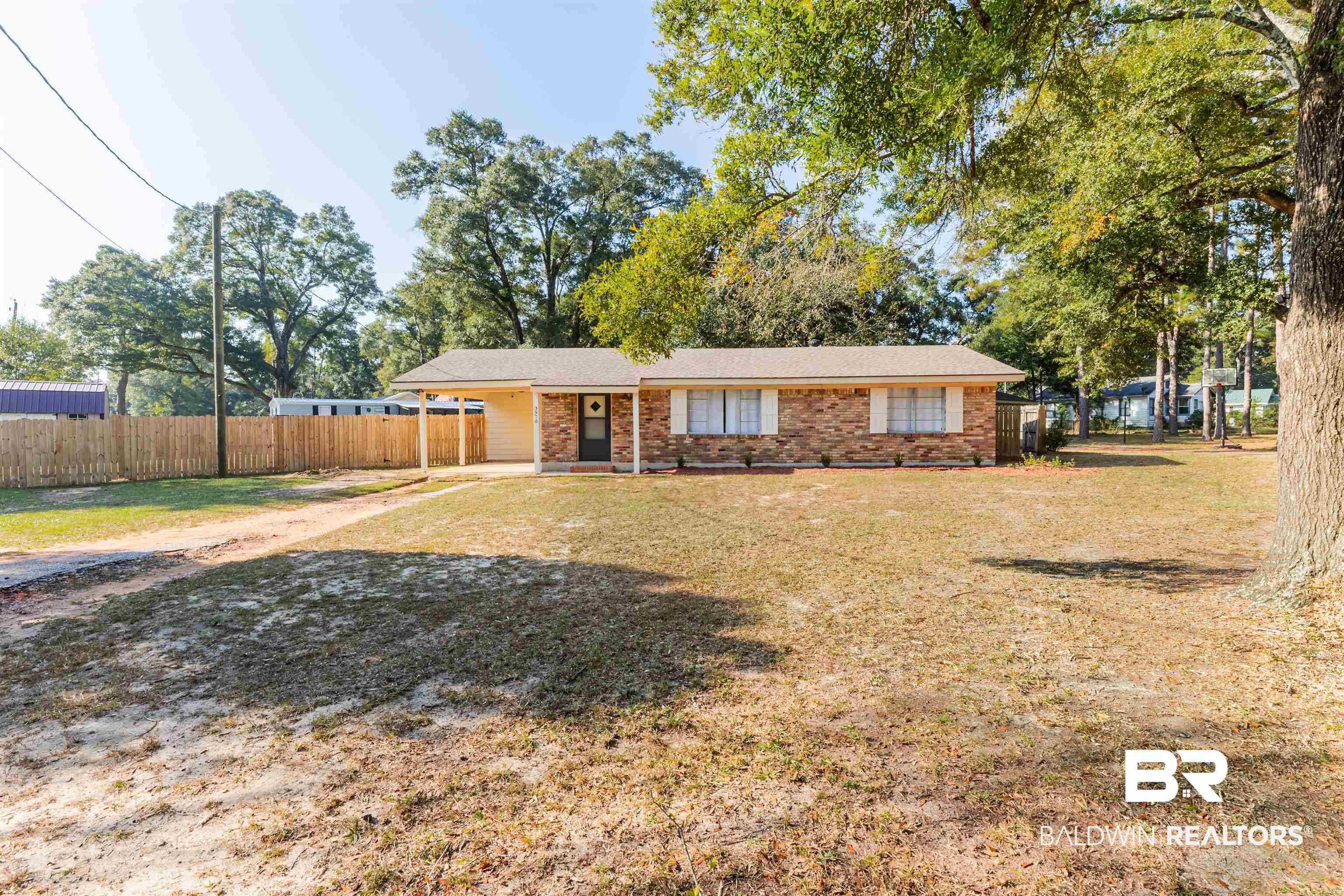 3970 Oak Ridge Avenue Mobile, AL 36619 - Photo 1 of 28 Ranch-style house featuring a front yard