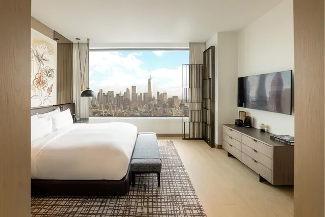 a kitchen with a table and chairs in it