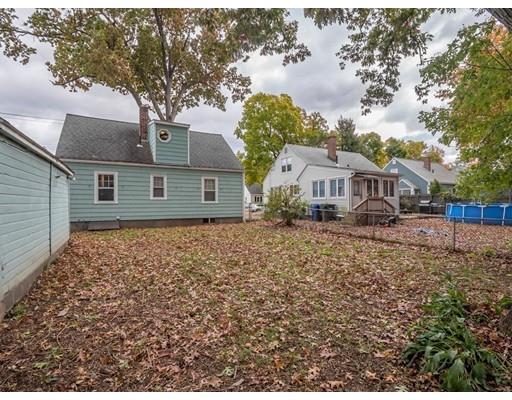 150 Powell Avenue Springfield, MA 01118 - Photo 23 of 24 front view of a house with a yard
