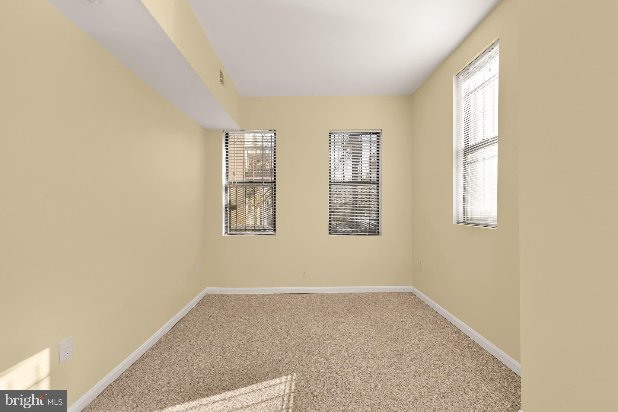 1768 Florida Avenue Northwest, Unit 1 Washington, DC 20009 - Photo 15 of 18 an empty room with windows
