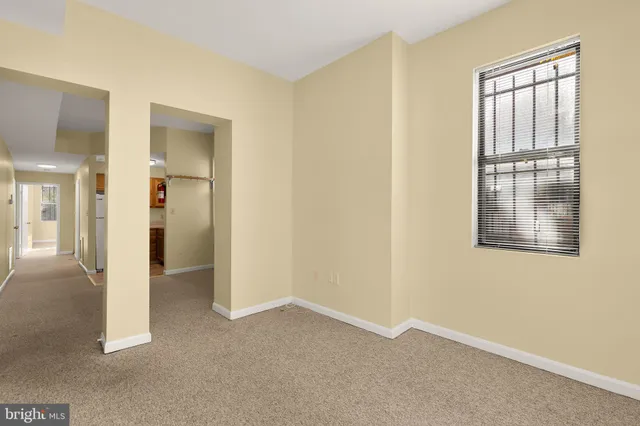 an empty room with windows