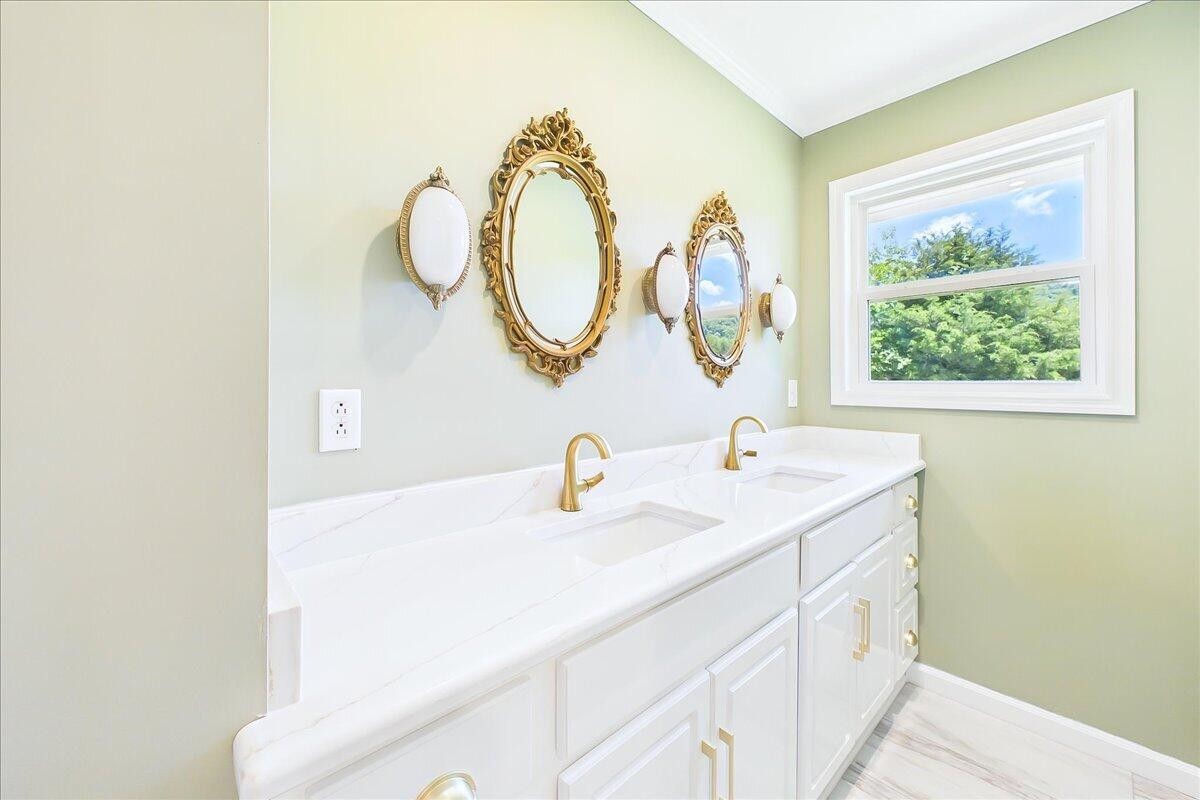 858 Main Street Decatur, TN 37322 - Photo 33 of 65 a bathroom with a sink and a mirror