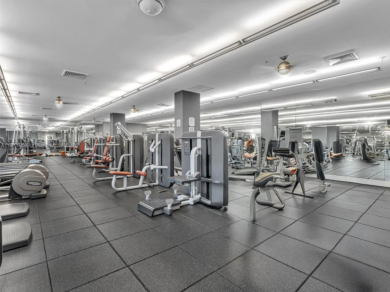 2001 Biscayne Boulevard, Unit 3205 Miami, FL 33137 - Photo 21 of 33 a view of a room with gym equipment
