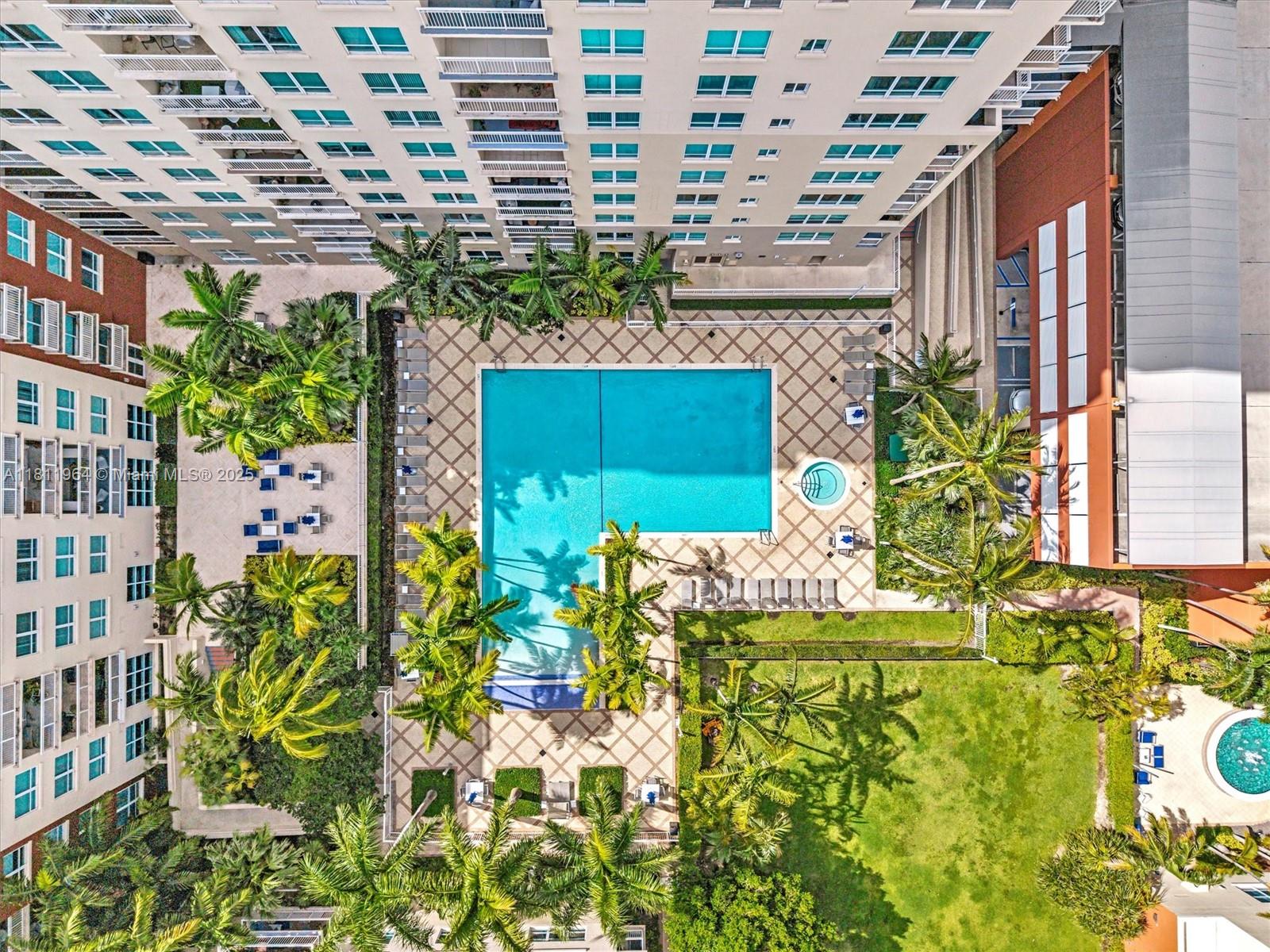 2001 Biscayne Boulevard, Unit 3205 Miami, FL 33137 - Photo 33 of 33 a vase of flowers sitting on a floor