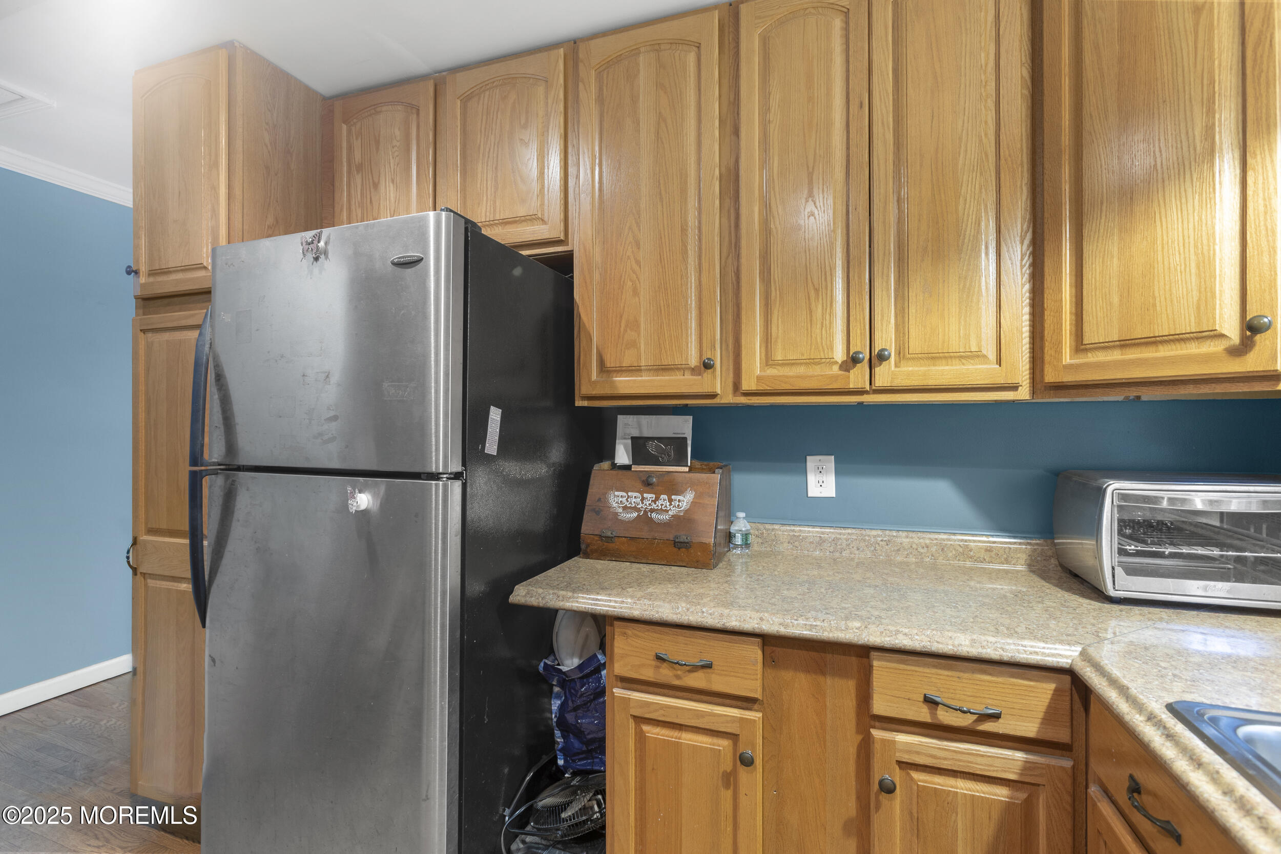742 West Commodore Boulevard Jackson, NJ 08527 - Photo 23 of 37 a kitchen with stainless steel appliances granite countertop a refrigerator a stove and a sink