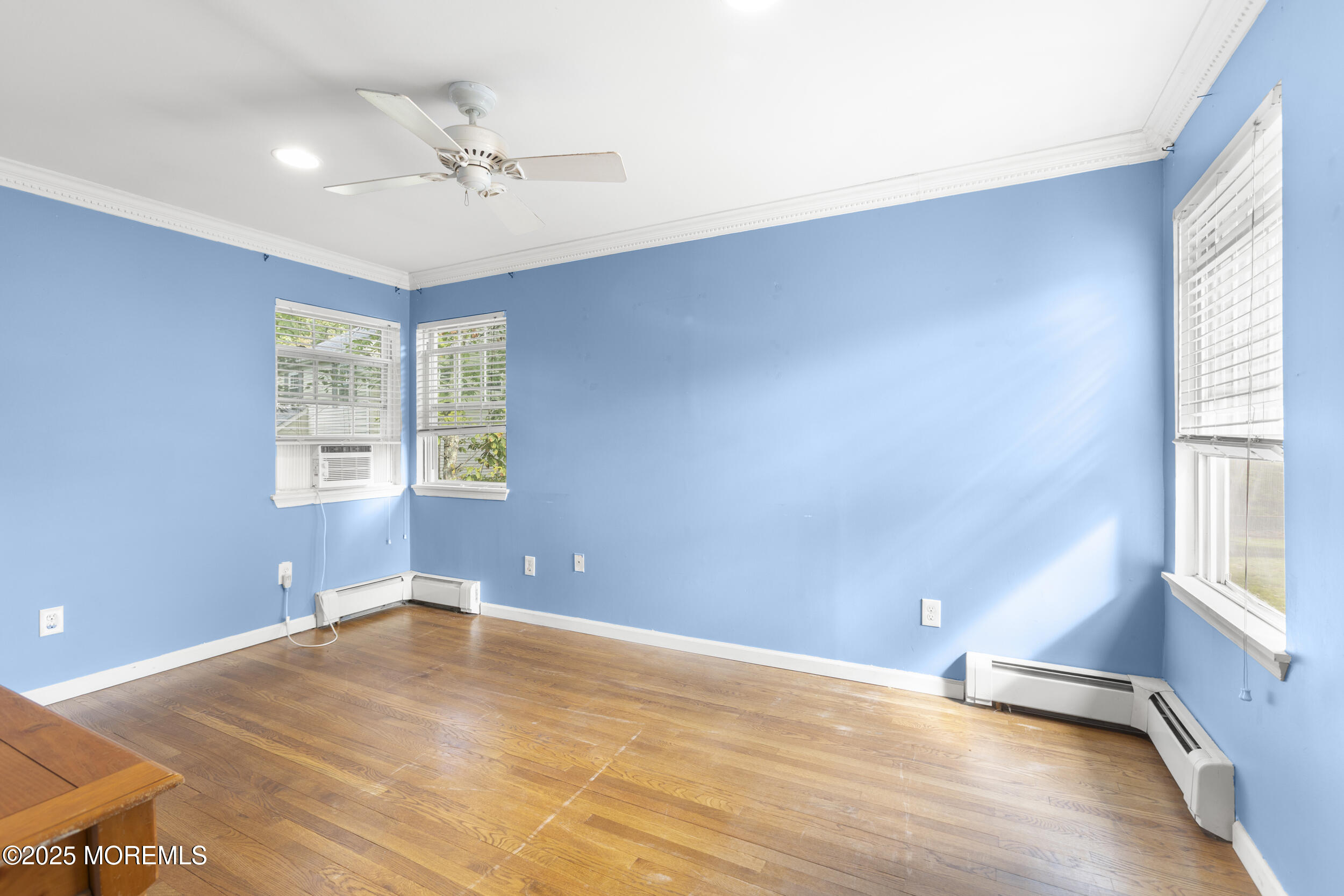 742 West Commodore Boulevard Jackson, NJ 08527 - Photo 24 of 37 wooden floor in an empty room with a window