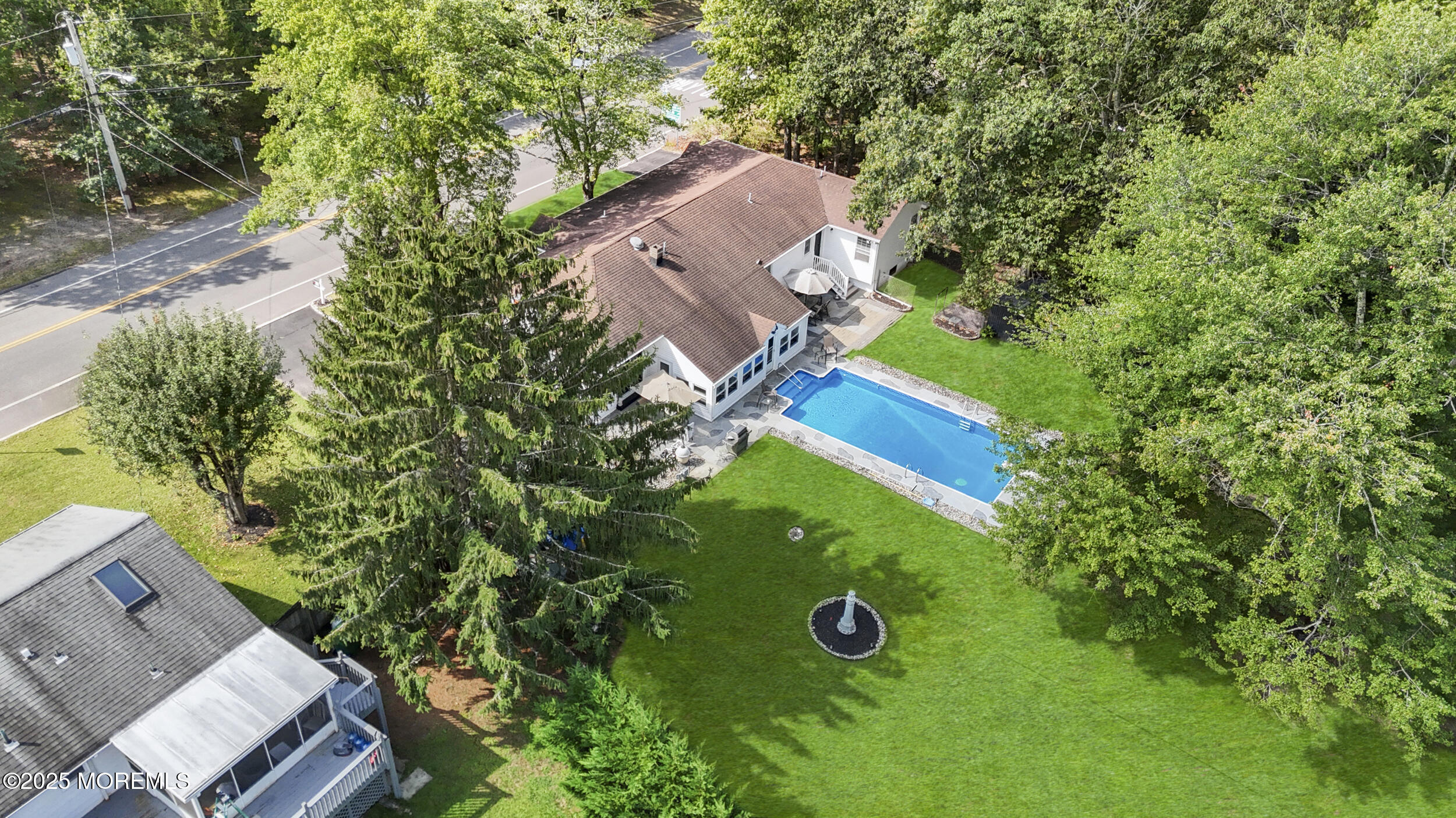 742 West Commodore Boulevard Jackson, NJ 08527 - Photo 32 of 37 an aerial view of a house with a yard