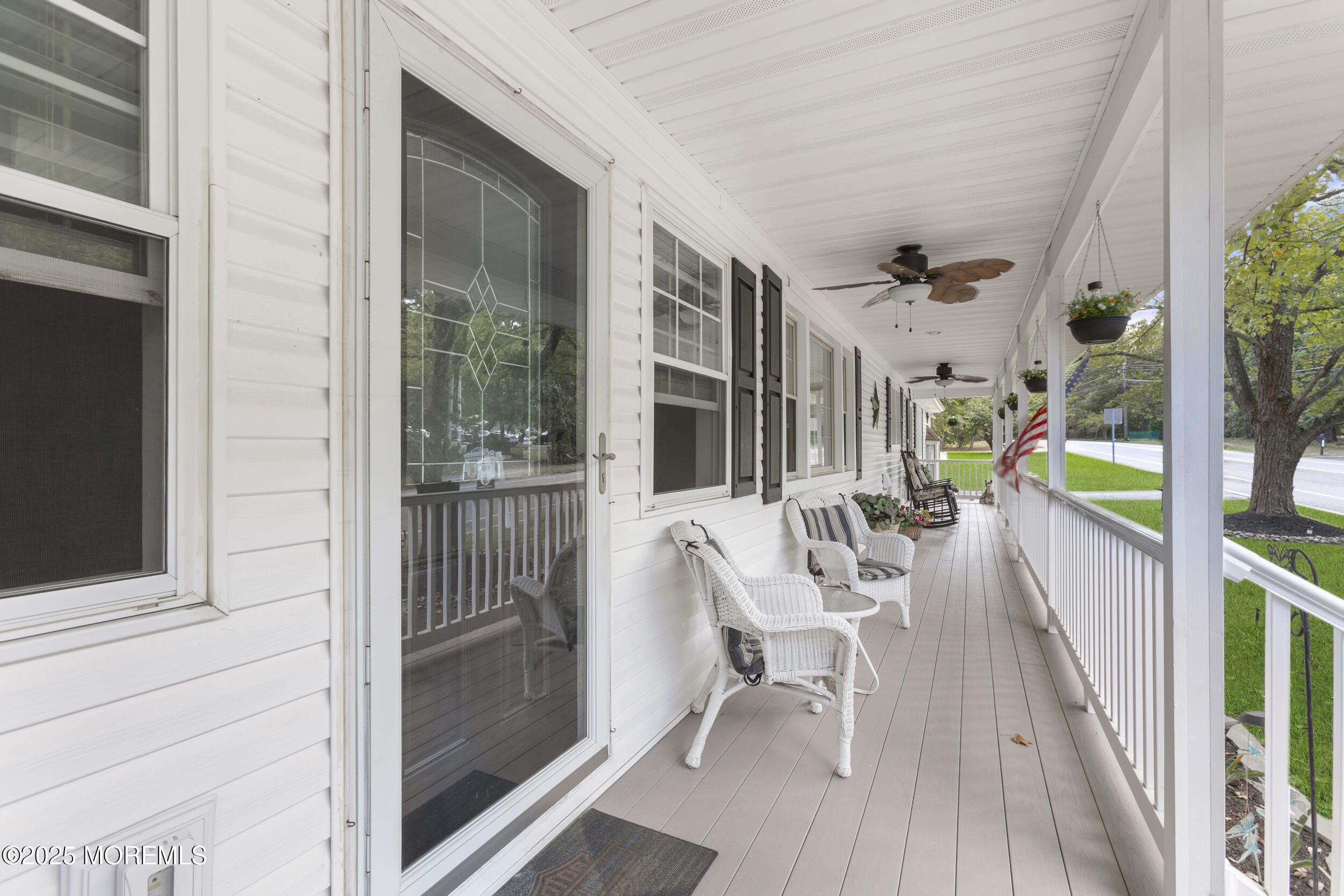 742 West Commodore Boulevard Jackson, NJ 08527 - Photo 4 of 37 a balcony with furniture and a potted plant