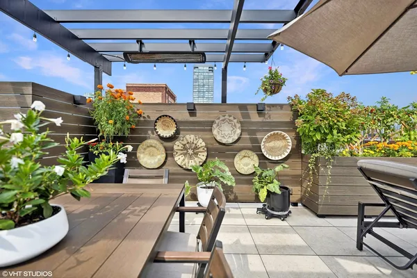 a living room with furniture garage and a large window