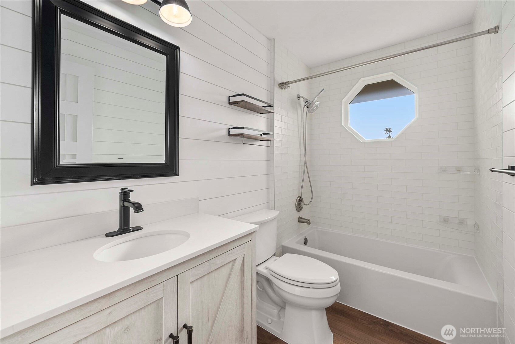 21816 Southeast 269th Street Maple Valley, WA 98038 - Photo 14 of 35 a bathroom with a sink a toilet and shower