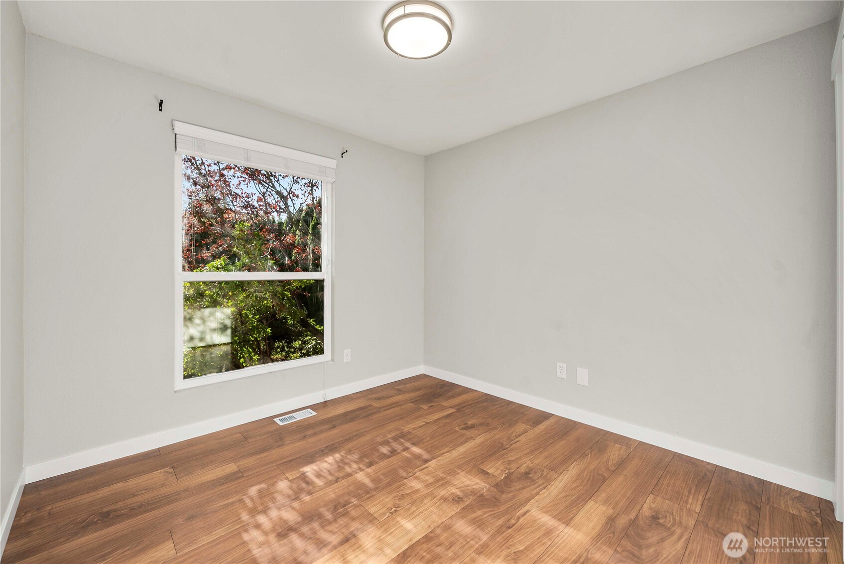 21816 Southeast 269th Street Maple Valley, WA 98038 - Photo 15 of 35 an empty room with a window