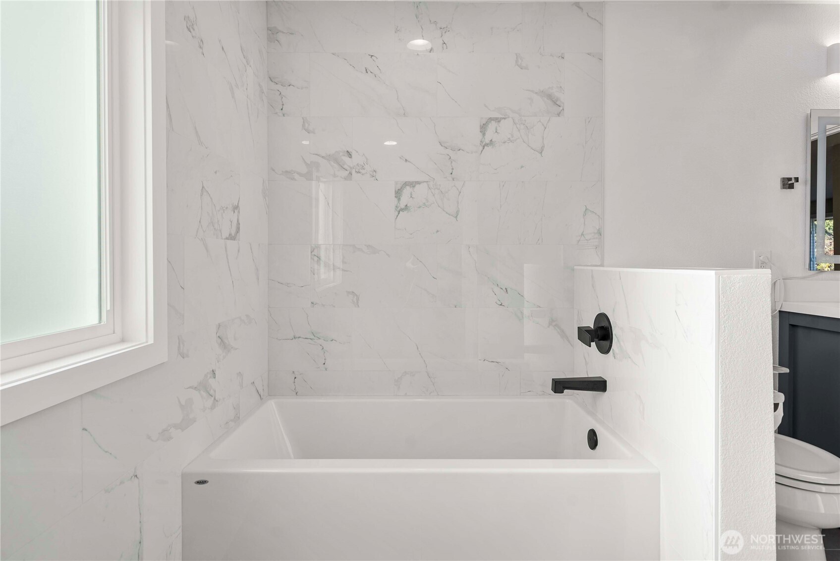 21816 Southeast 269th Street Maple Valley, WA 98038 - Photo 20 of 35 a bathroom with a bathtub