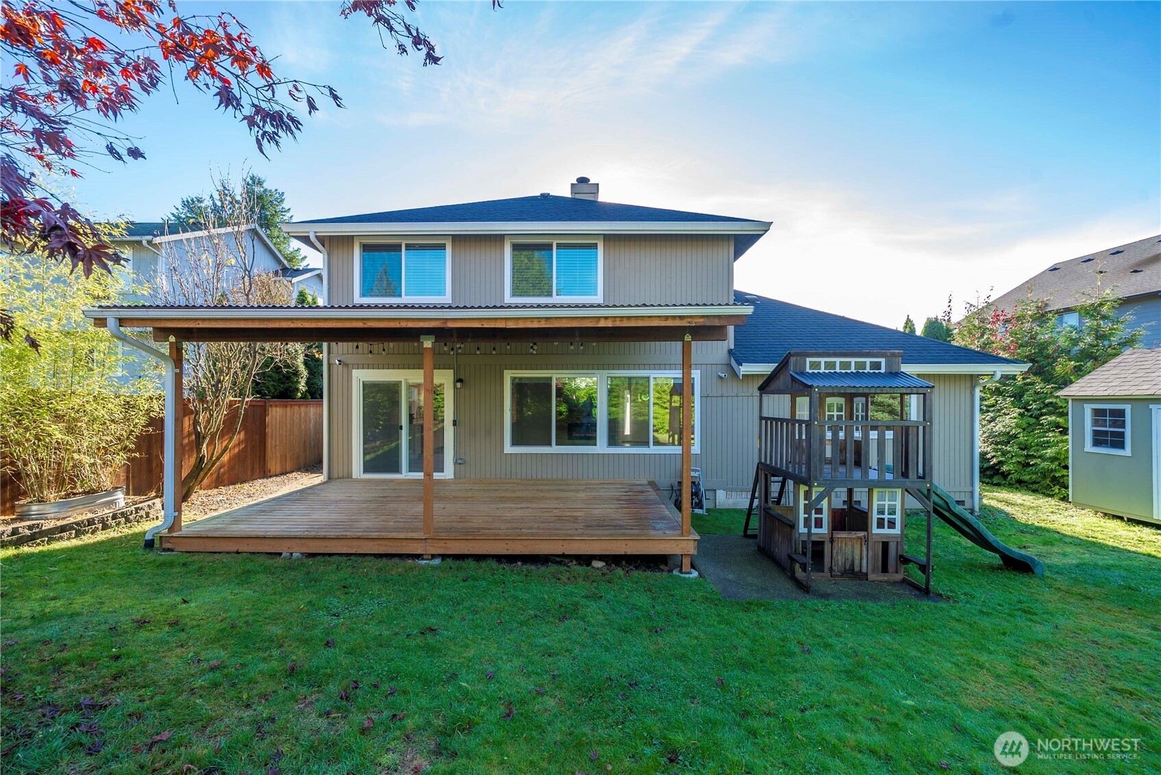 21816 Southeast 269th Street Maple Valley, WA 98038 - Photo 24 of 35 a view of an house with backyard space and balcony