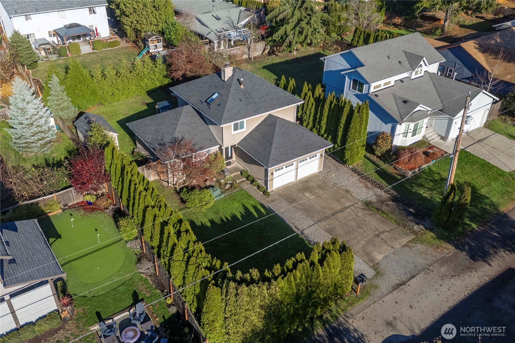 21816 Southeast 269th Street Maple Valley, WA 98038 - Photo 28 of 35 an aerial view of a house with a garden