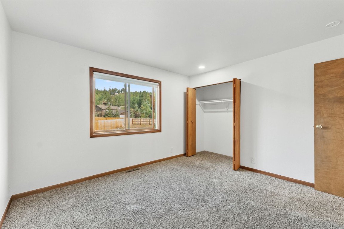 114 Big Elk Road Dillon, CO 80435 - Photo 23 of 50 a view of an empty room with a window