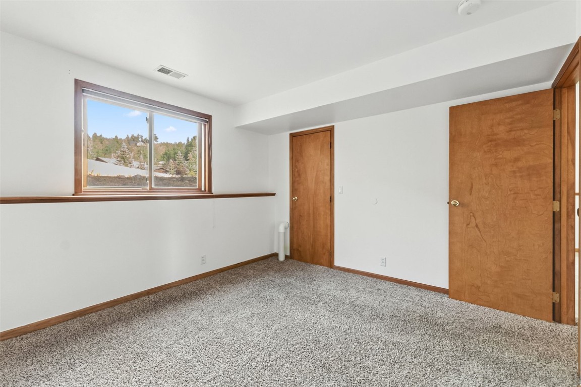114 Big Elk Road Dillon, CO 80435 - Photo 40 of 50 an empty room with windows