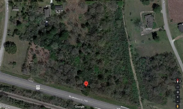 an aerial view of residential house with outdoor space