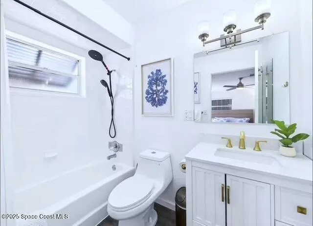 a bathroom with a sink a toilet and a bathtub