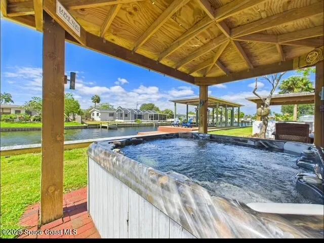 a view of a swimming pool with a patio