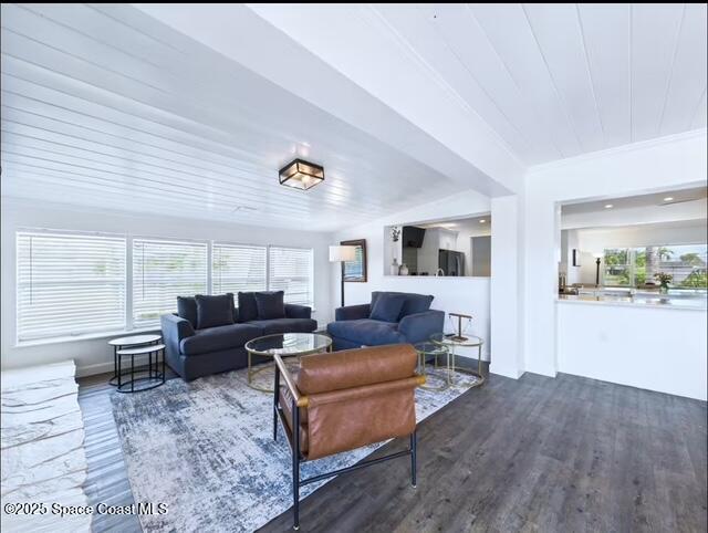 1747 Wavecrest Street Merritt Island, FL 32952 - Photo 9 of 21 a living room with furniture and a flat screen tv