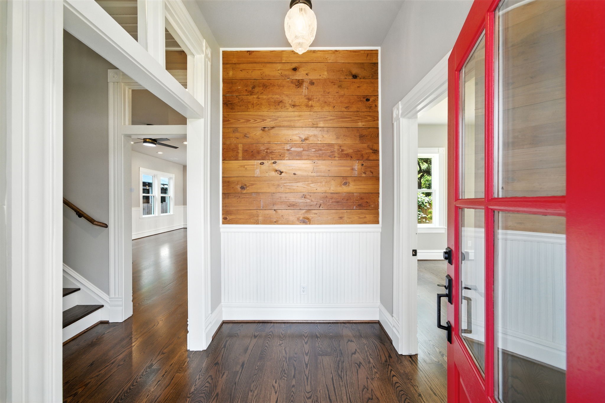 1521 Ovid Street Houston, TX 77007 - Photo 4 of 44 Step in through the builder - FW Heritage's signature red front door, into a welcoming entry foyer. Reclaimed shiplap and wainscoting feature in here!