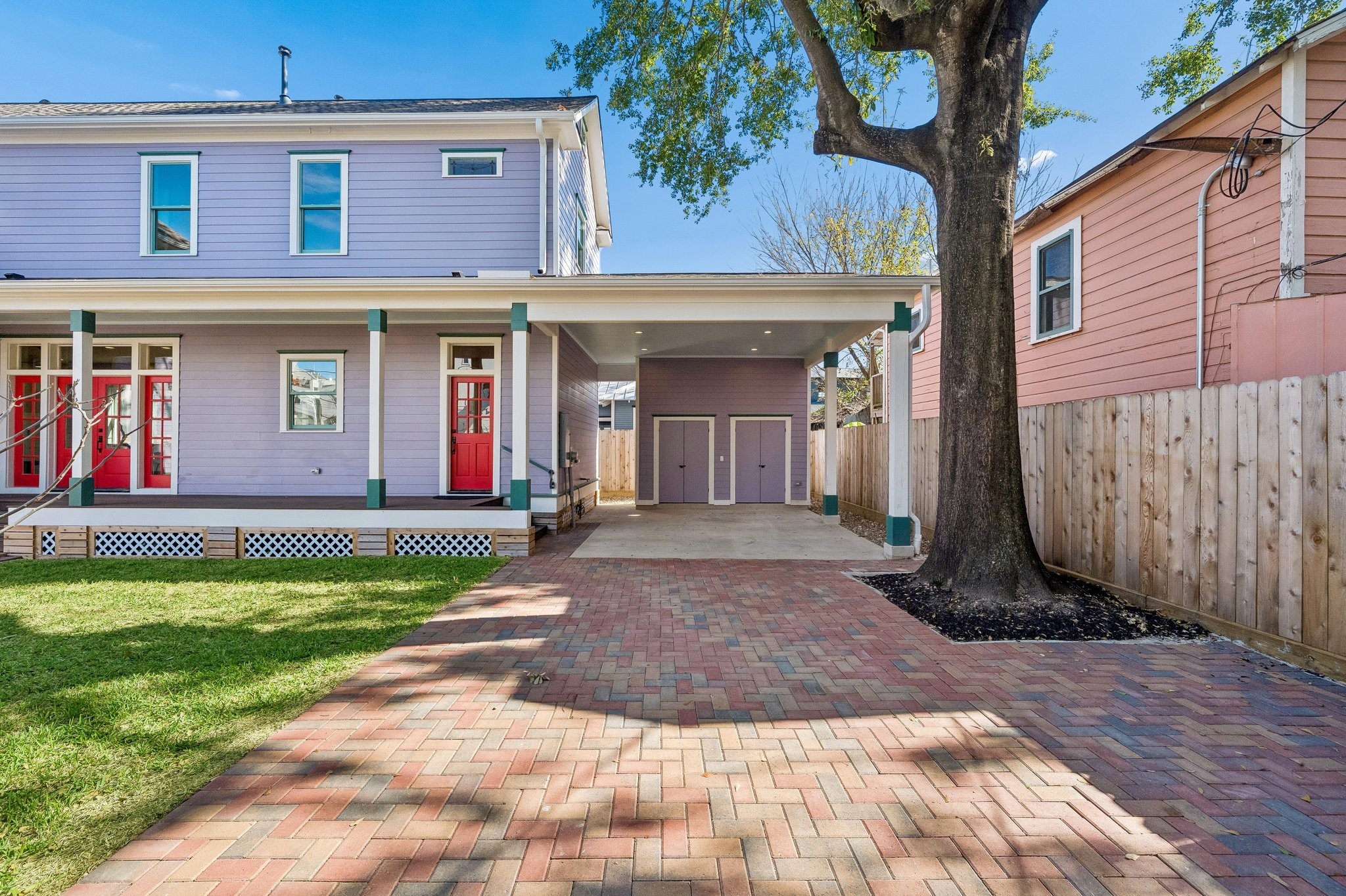 1521 Ovid Street Houston, TX 77007 - Photo 44 of 44 2-car carport with additional off-street parking within the property line for 2 more vehicles. Storage "sheds" built at the rear of the carport. EV charger installed