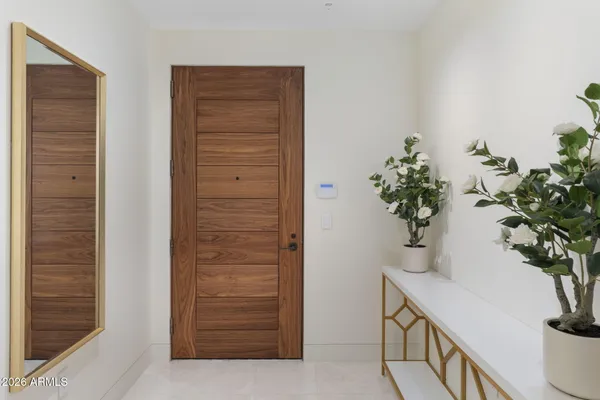 a view with a sink and a mirror