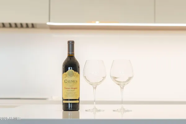 a bedroom with a large bed and a couch