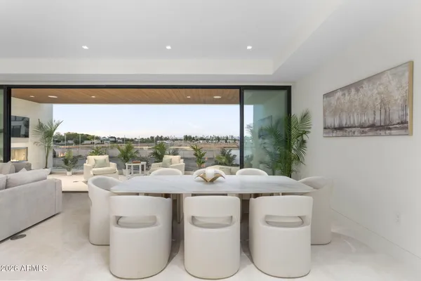 a view of city with tall buildings and a yard