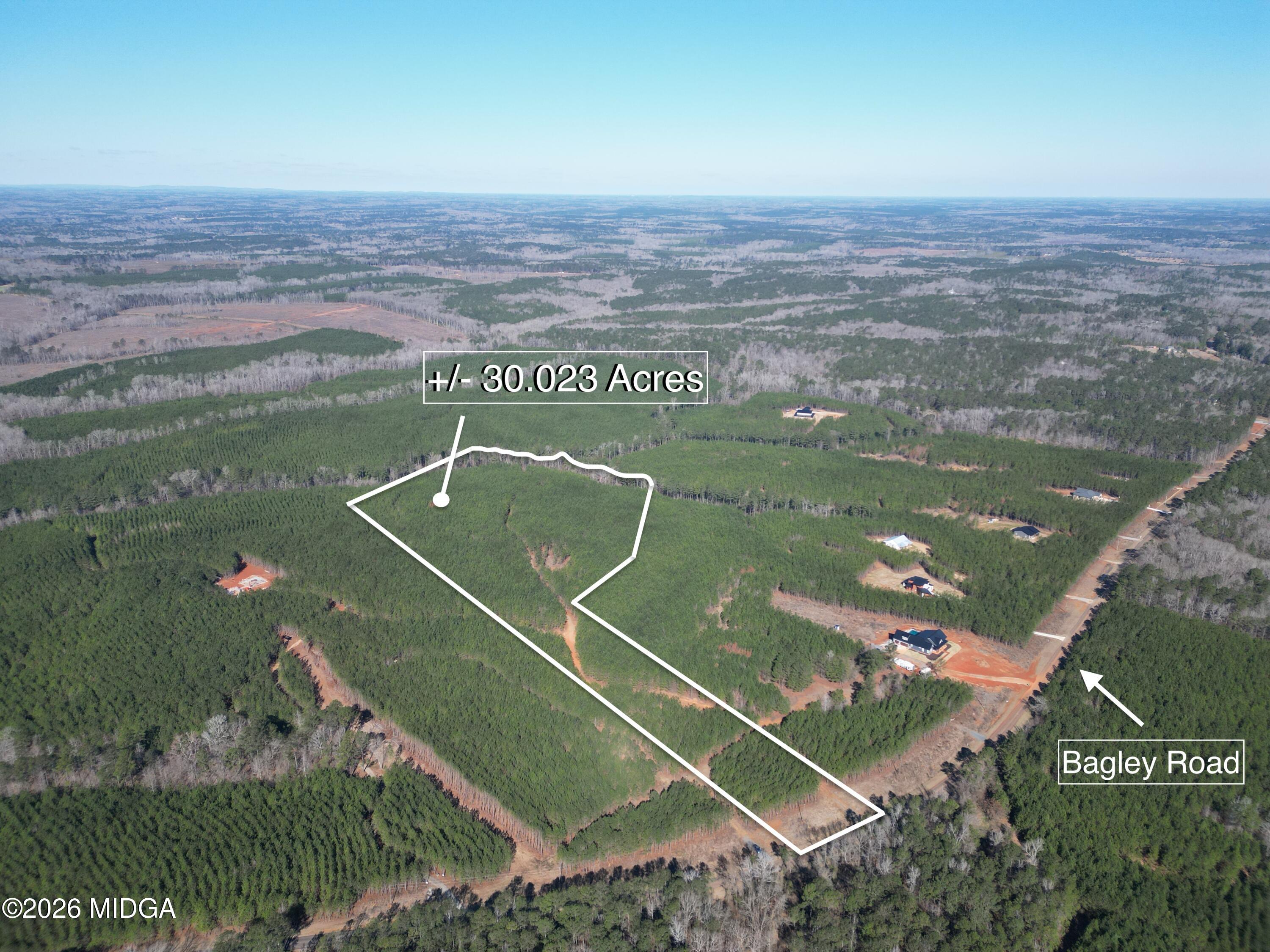457 Bagley Road Forsyth, GA 31029 - Photo 2 of 7 a view of a tennis court