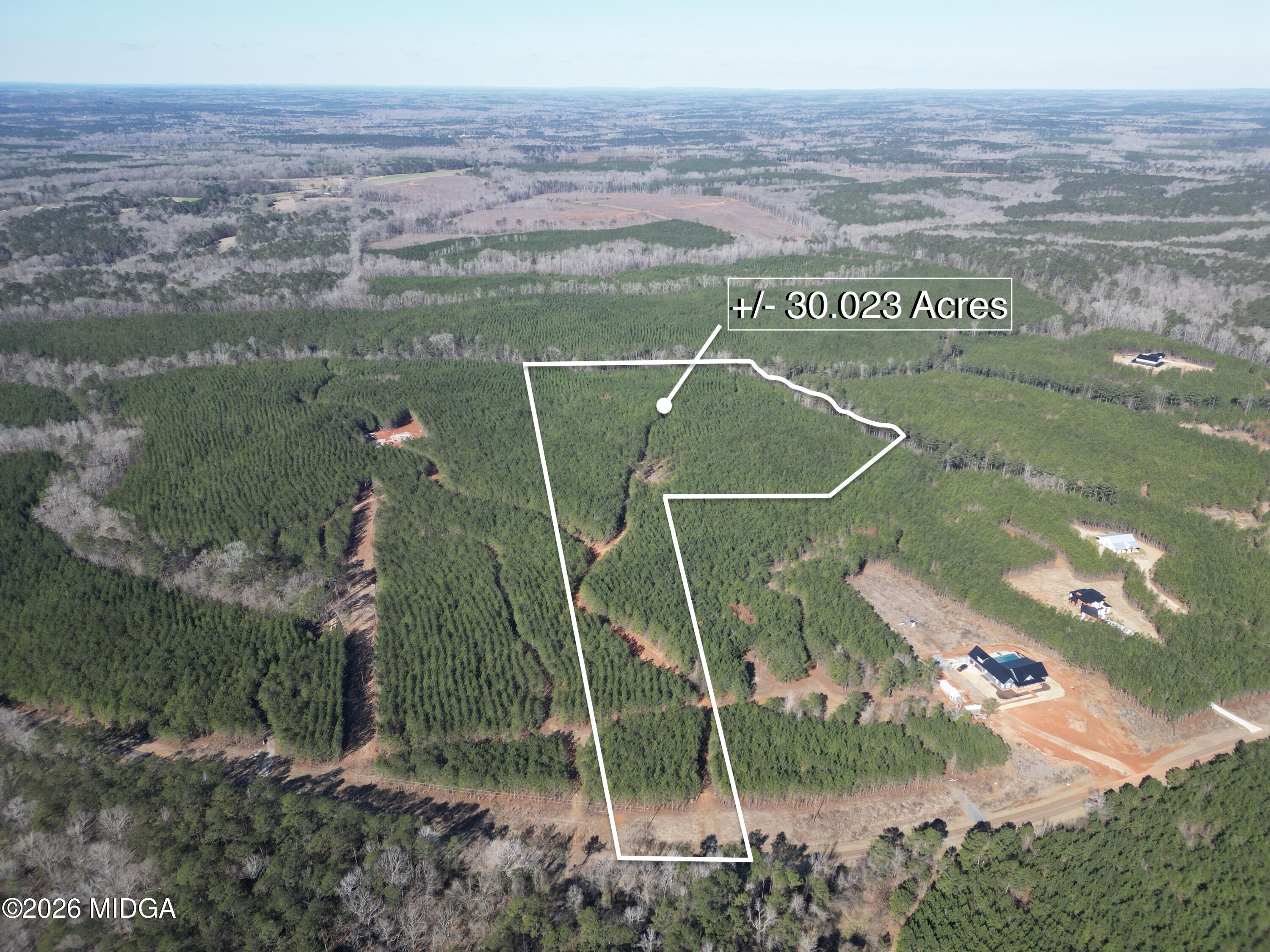 457 Bagley Road Forsyth, GA 31029 - Photo 4 of 7 a view of a tennis court