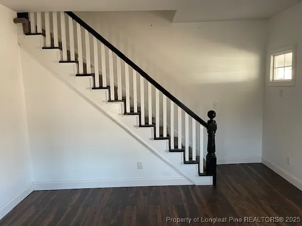 a view of entryway with wooden floor