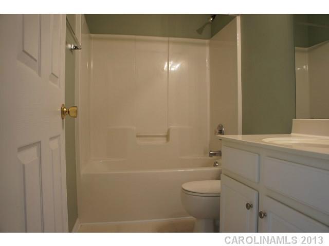 710 Shellstone Place, Unit 710 Fort Mill, SC 29708 - Photo 12 of 14 a bathroom with a sink a toilet and shower