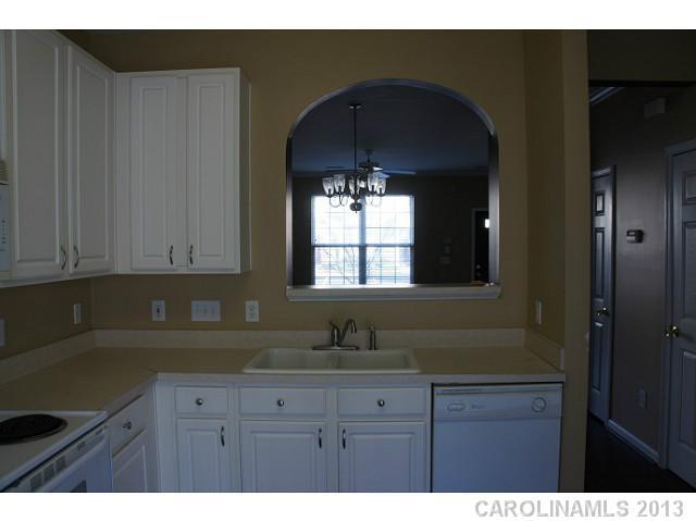 710 Shellstone Place, Unit 710 Fort Mill, SC 29708 - Photo 6 of 14 a kitchen with sink and cabinets