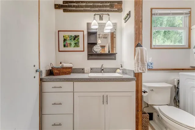 a view of a hallway with washer and dryer