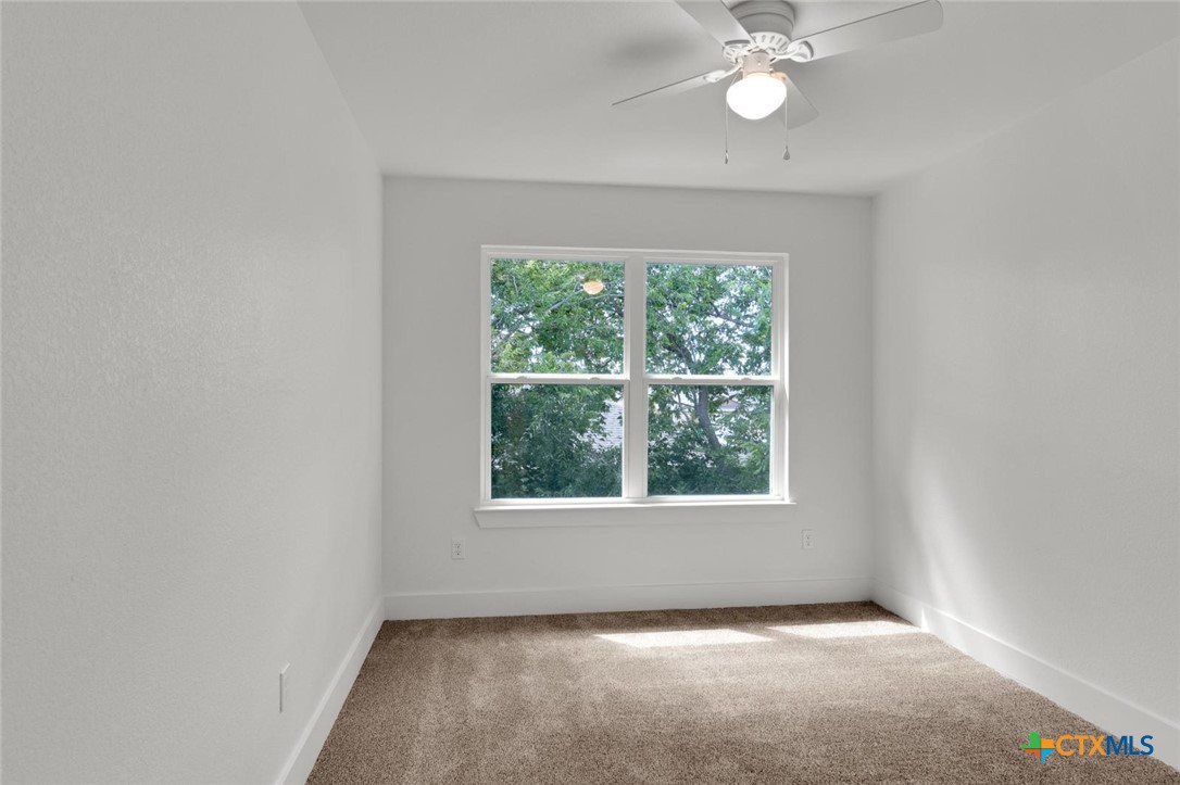 1924 Royal Loop Belton, TX 76513 - Photo 11 of 15 an empty room with a window