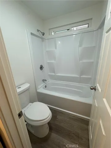 a bathroom with a double vanity sink and mirror