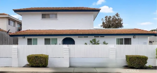 a front view of a house with garage