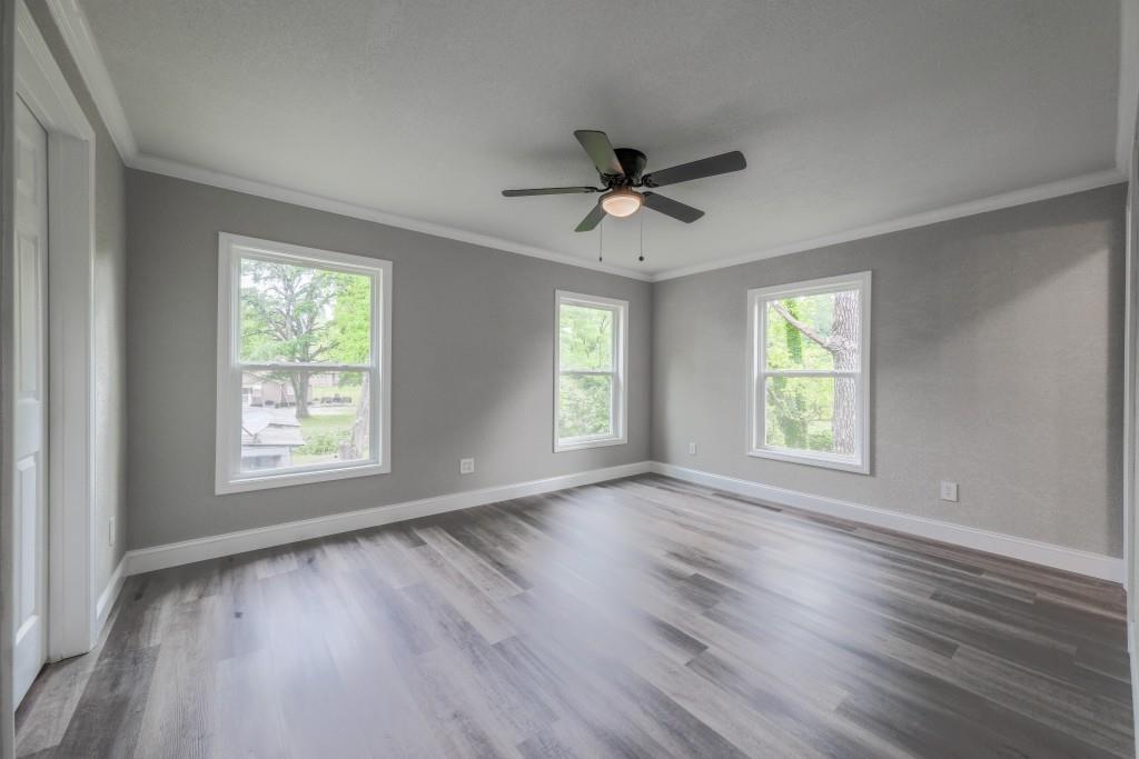 11 Cloverhurst Drive Toccoa, GA 30577 - Photo 11 of 26 a view of empty room with wooden floor and fan