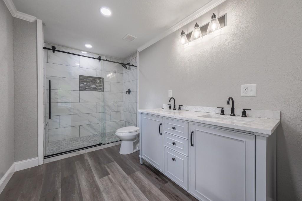 11 Cloverhurst Drive Toccoa, GA 30577 - Photo 14 of 26 a spacious bathroom with a double vanity sink toilet and shower