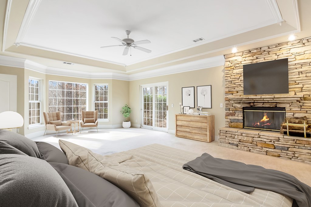 8010 Scudder Way Ball Ground, GA 30107 - Photo 20 of 57 a spacious bedroom with a bed and a flat screen tv