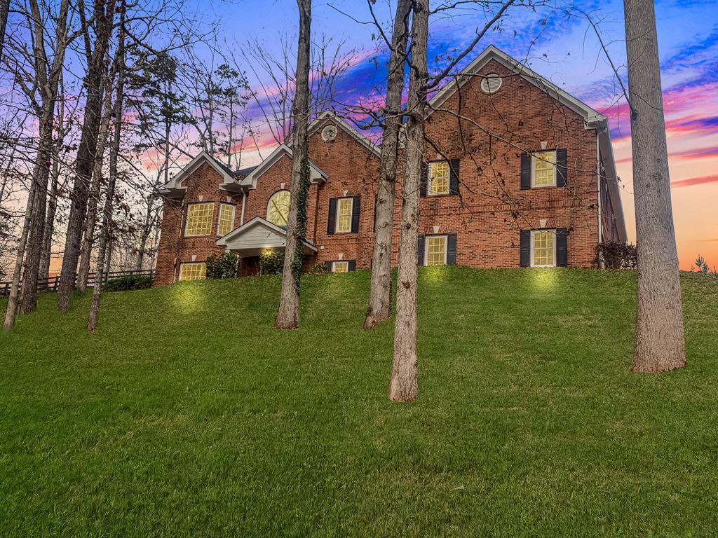 8010 Scudder Way Ball Ground, GA 30107 - Photo 2 of 57 a backyard of a house with lots of green space