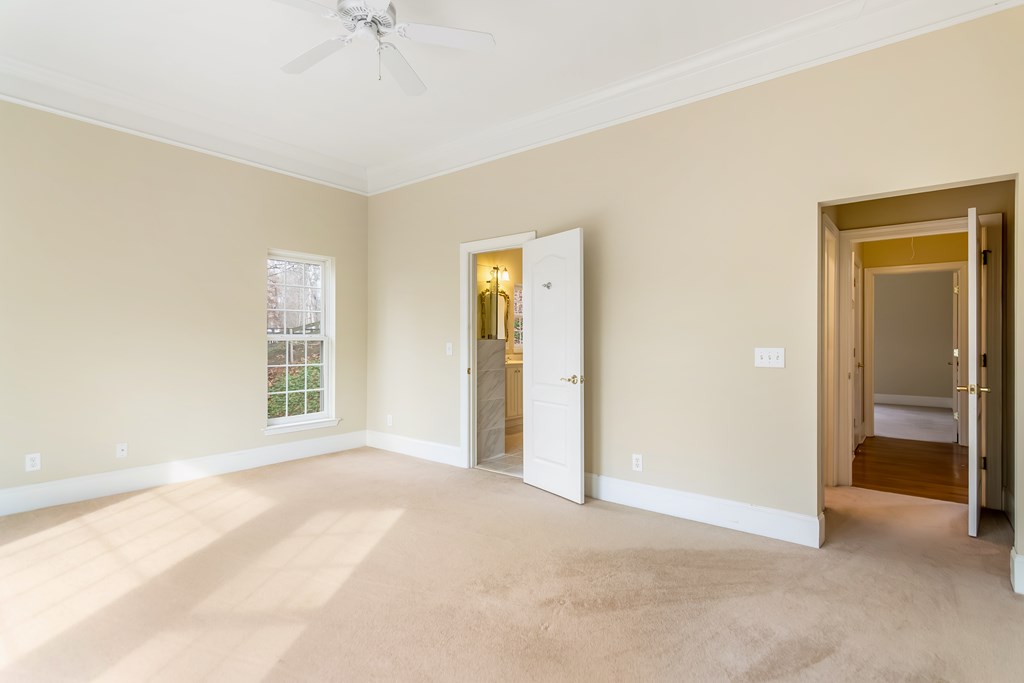 8010 Scudder Way Ball Ground, GA 30107 - Photo 31 of 57 a view of a room with a ceiling fan and a window