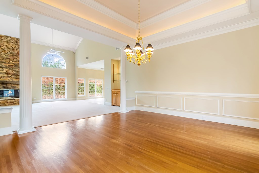 8010 Scudder Way Ball Ground, GA 30107 - Photo 38 of 57 a view of an empty room with wooden floor and a window