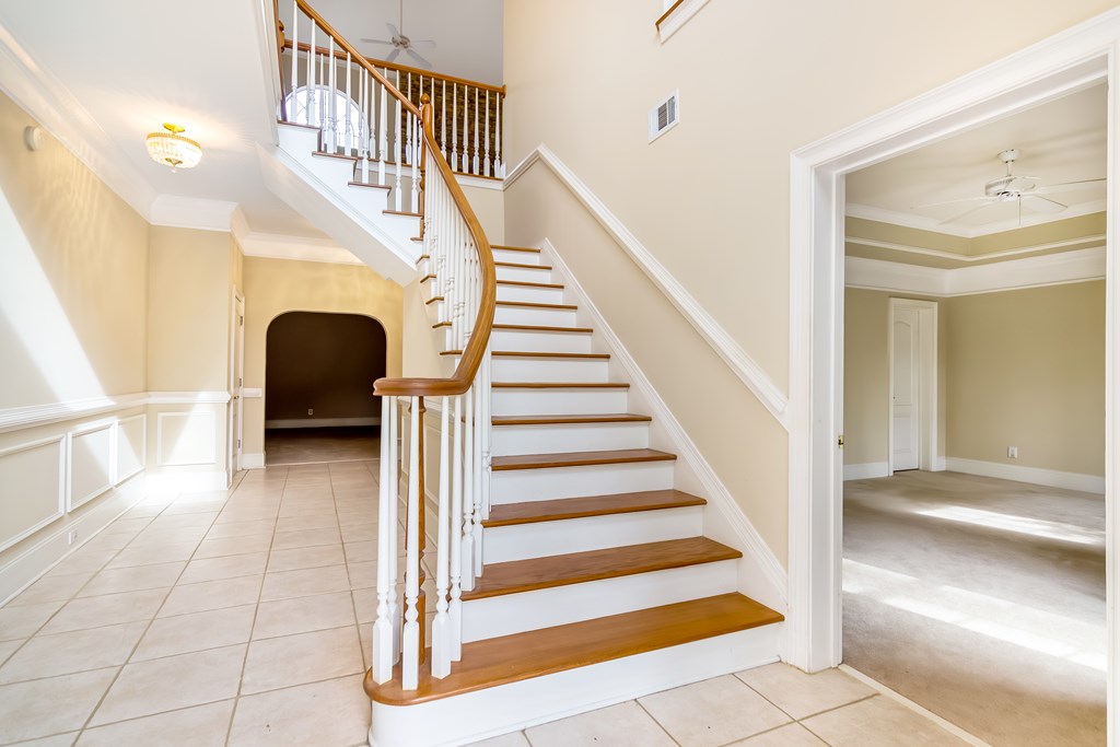8010 Scudder Way Ball Ground, GA 30107 - Photo 6 of 57 a view of entryway and hall with wooden floor