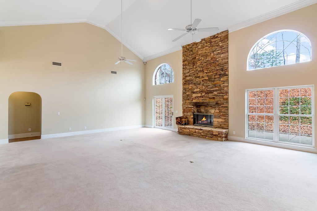 8010 Scudder Way Ball Ground, GA 30107 - Photo 9 of 57 an empty room with windows